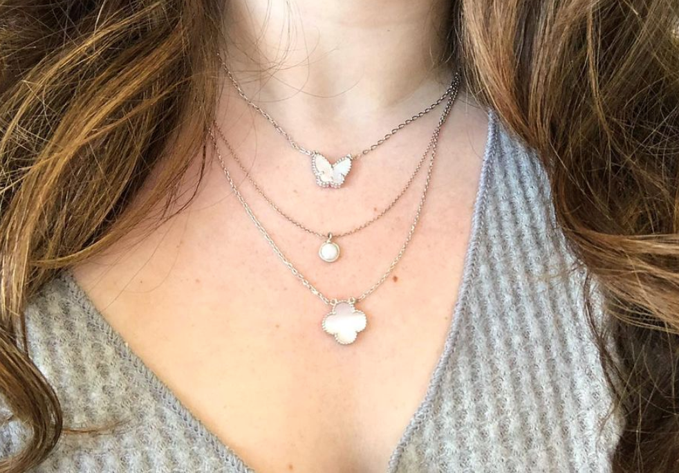 clover necklace and butterfly necklace 